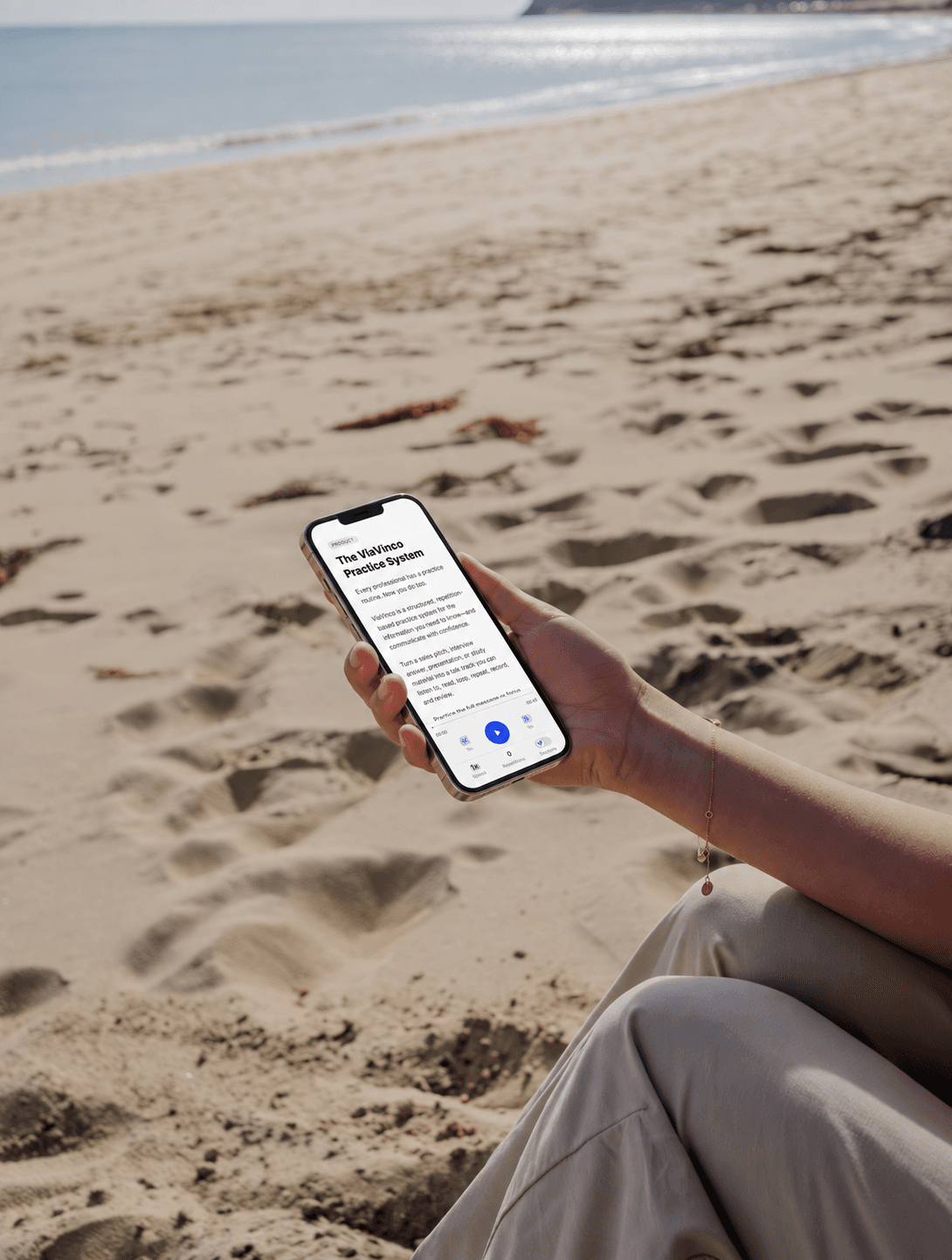 ViaVinco talk track player used while sitting at the beach